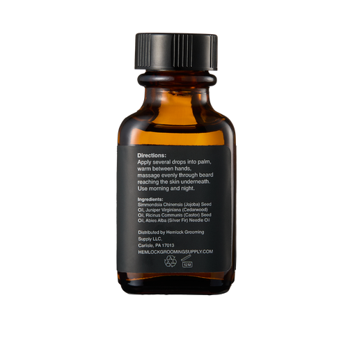 Hemlock Cedarwood Beard Oil amber glass bottle, back label with directions and ingredient list