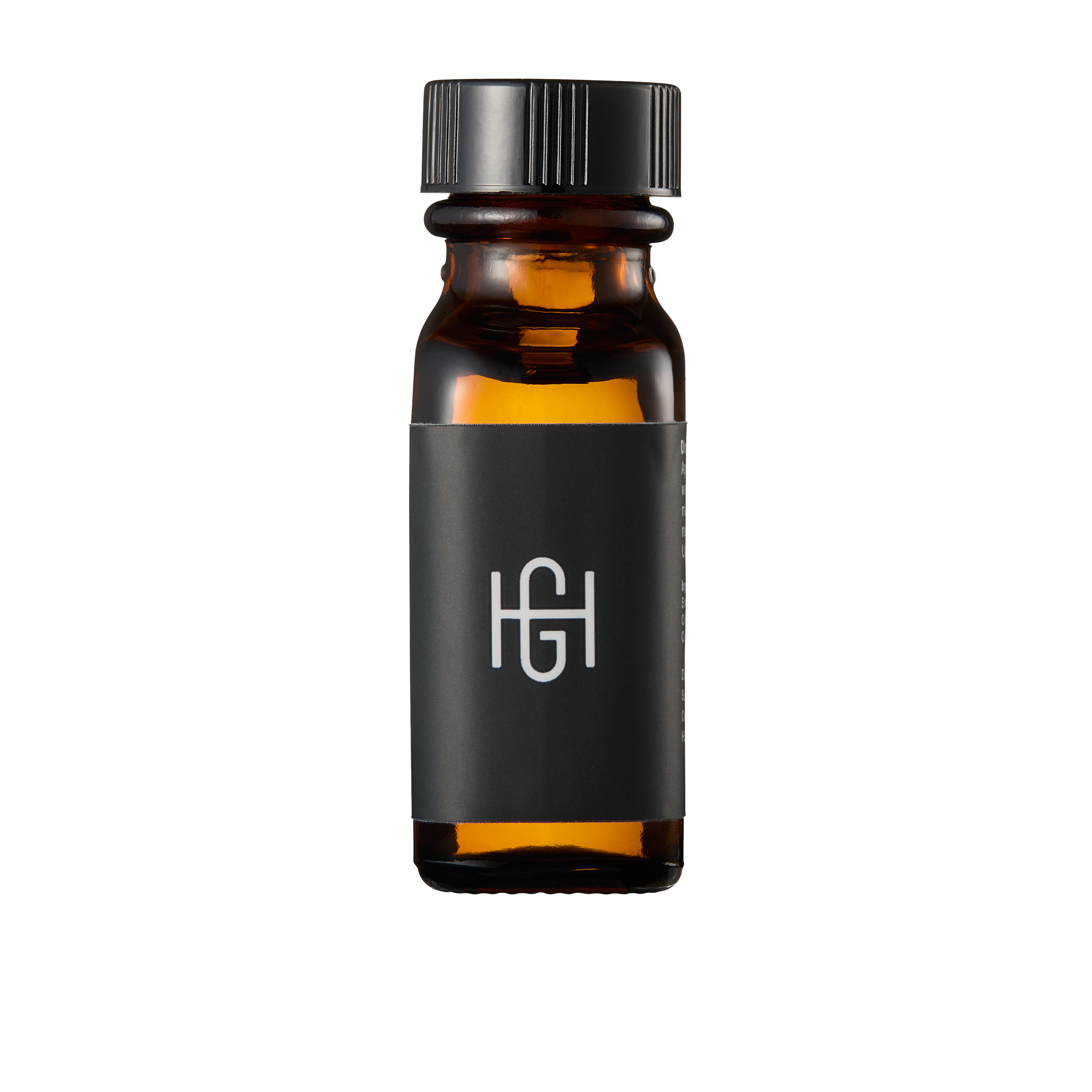 Hemlock Cedarwood Beard Oil amber glass bottle, front view with HG logo label and black cap