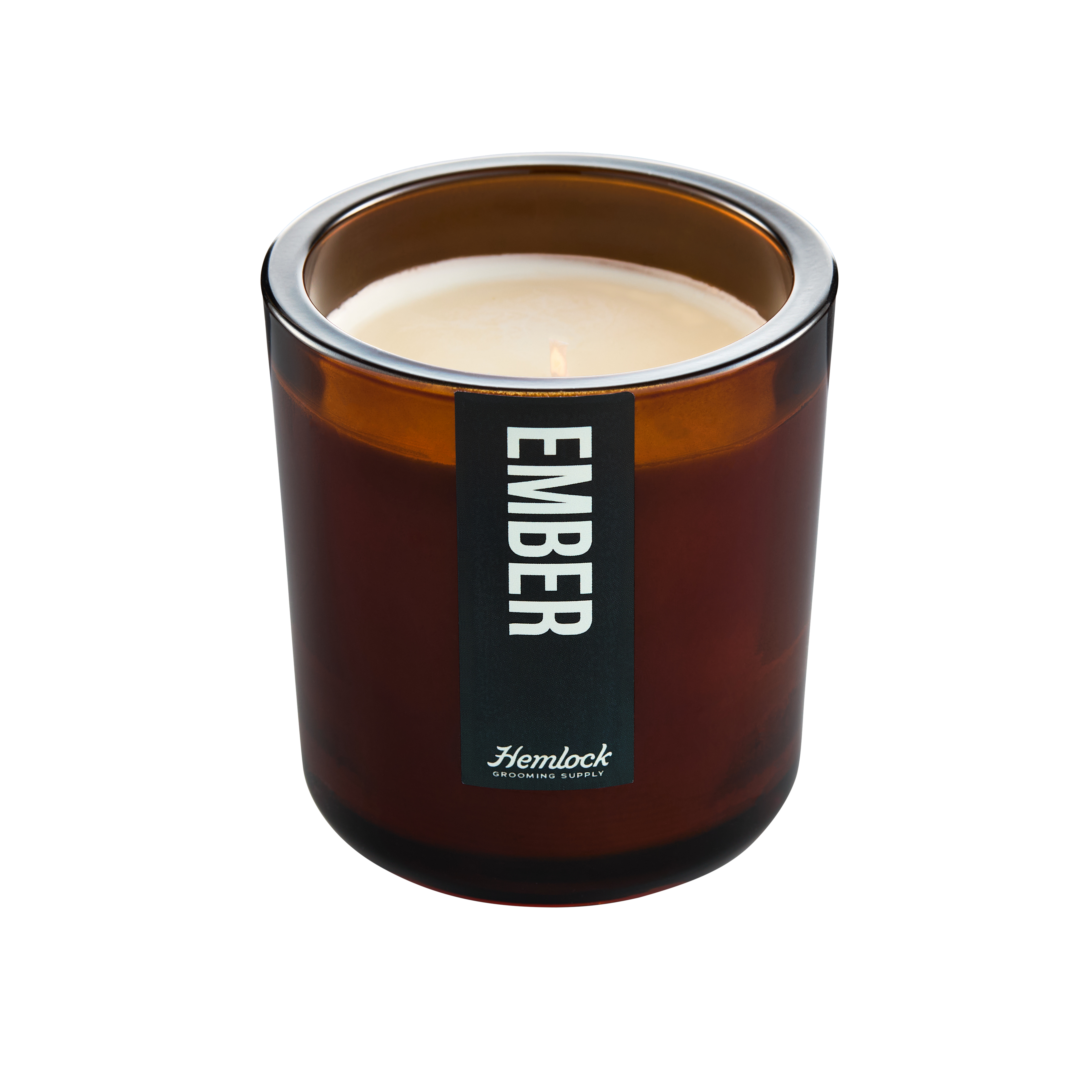 Hemlock Campfire Candle in amber glass jar, front label reading Ember, showing wax and wick