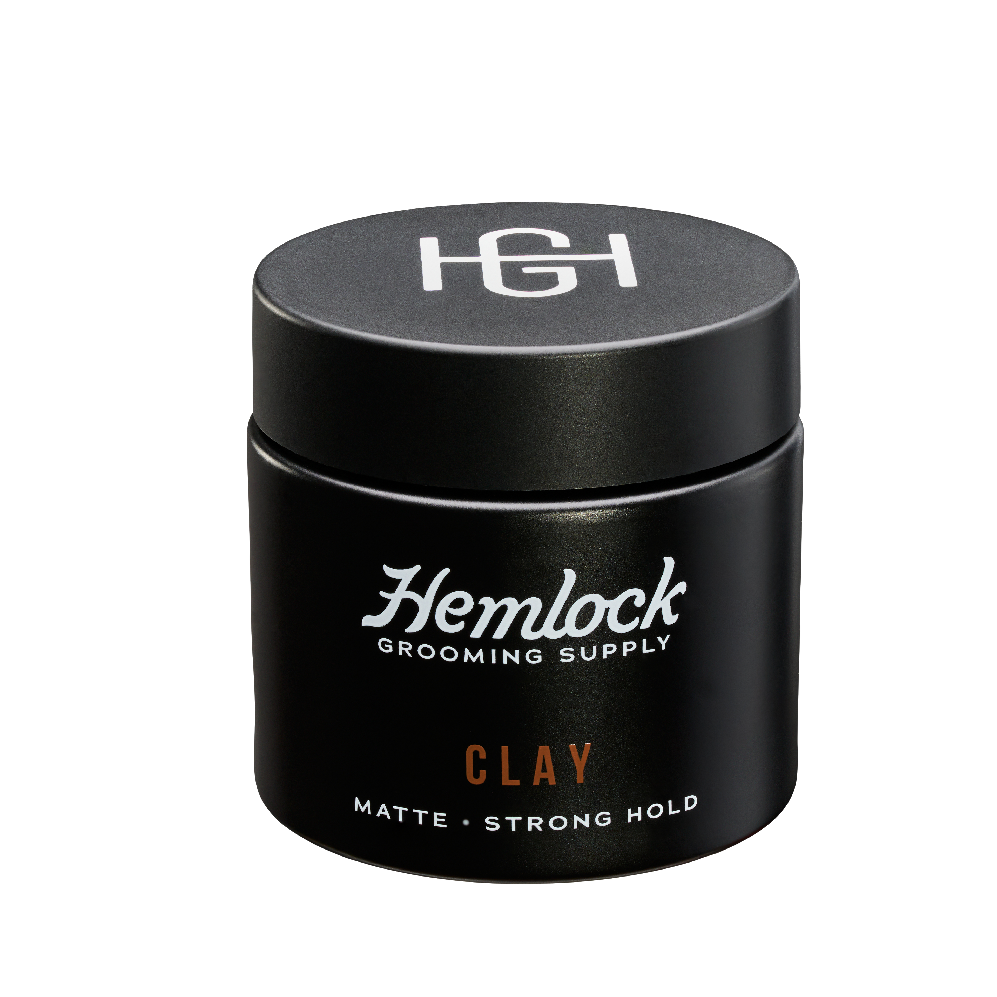 Hemlock hair clay 2 oz matte strong-hold styling clay jar, angled view with HG logo lid and front label