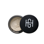 Hemlock hair clay 2 oz open jar showing clay texture with black HG logo lid