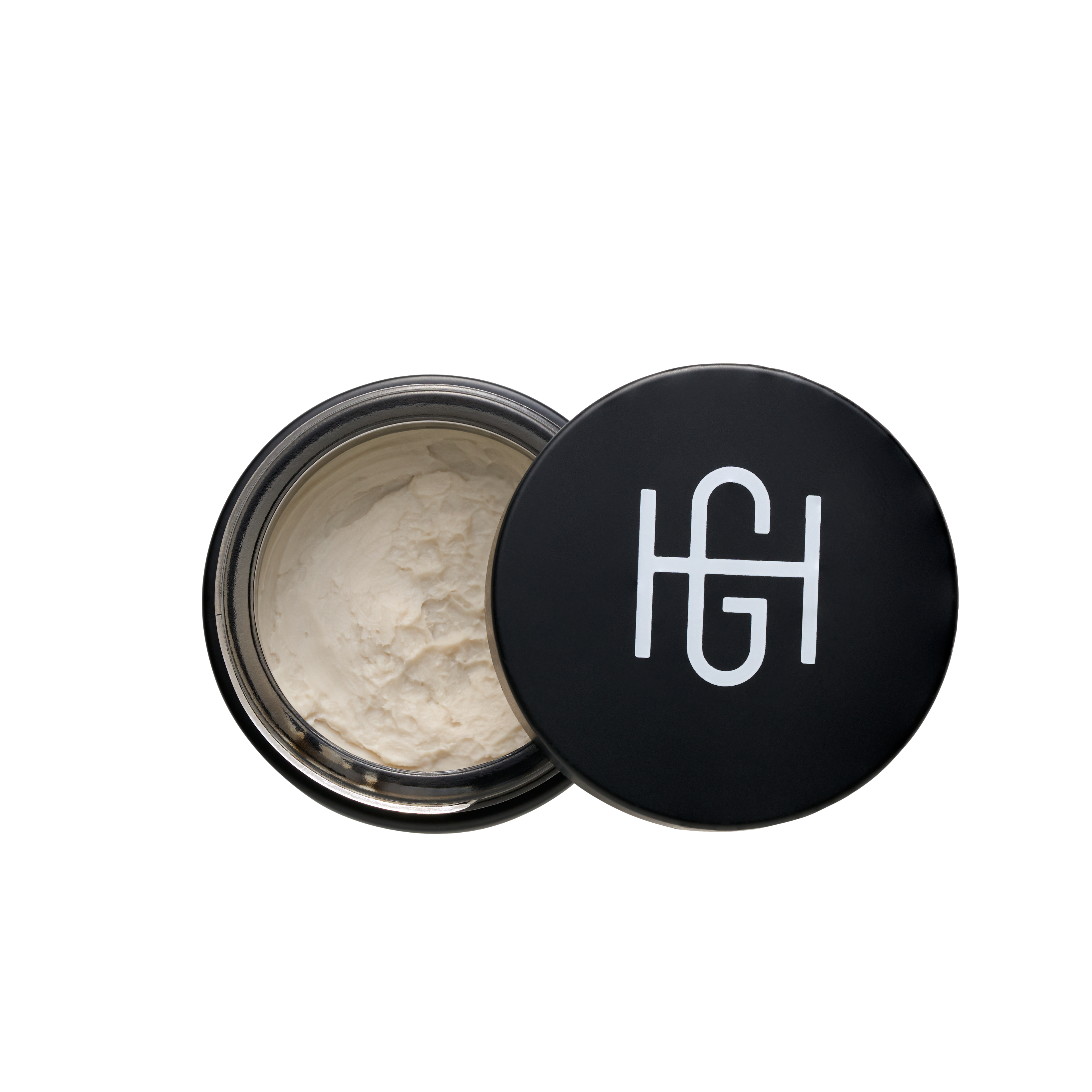 Hemlock hair clay 2 oz open jar showing clay texture with black HG logo lid