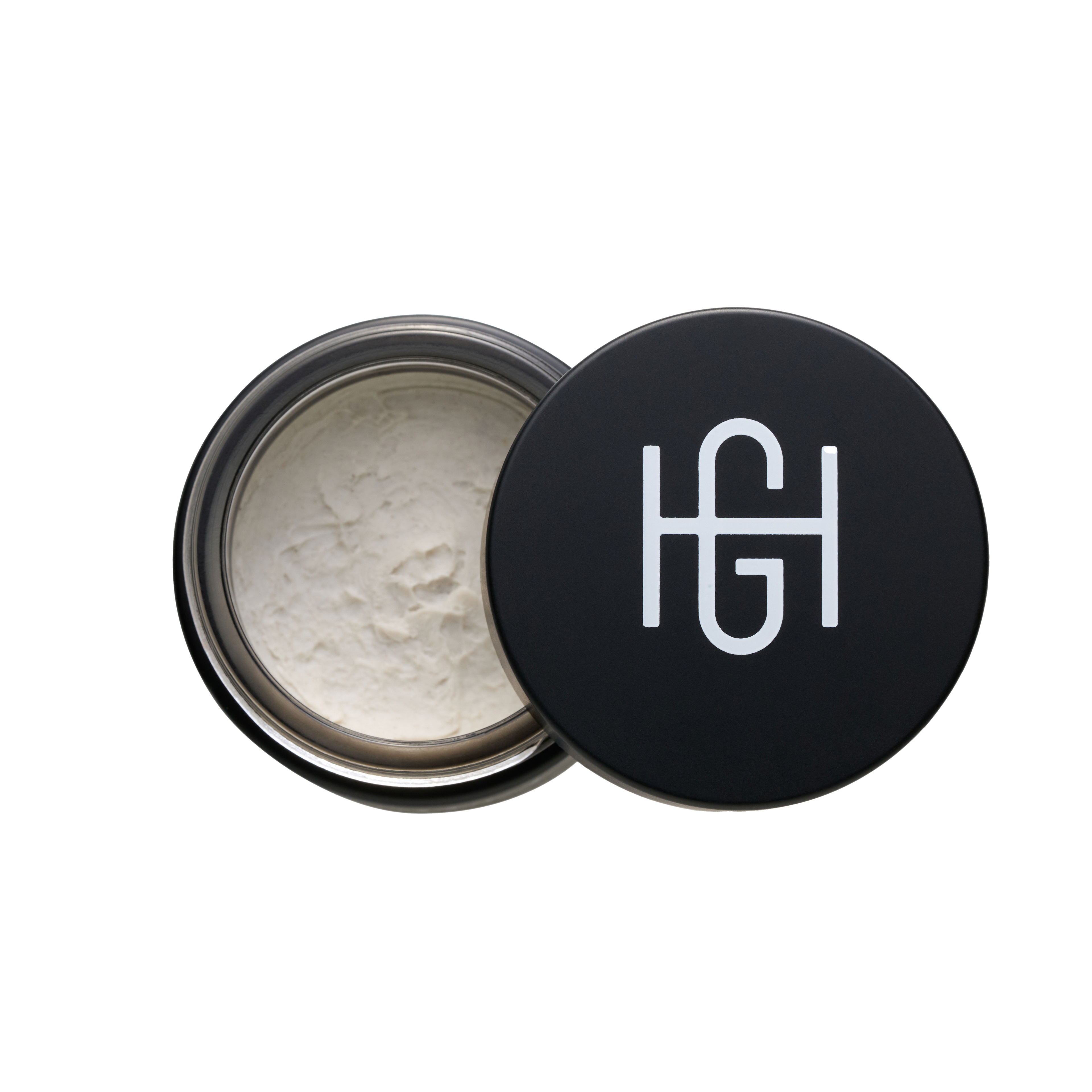 Hemlock Hair Paste open jar showing paste texture with black HG logo lid