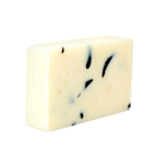 Hemlock tea tree cedarwood soap bar, handmade cold process soap with botanical flecks, angled view